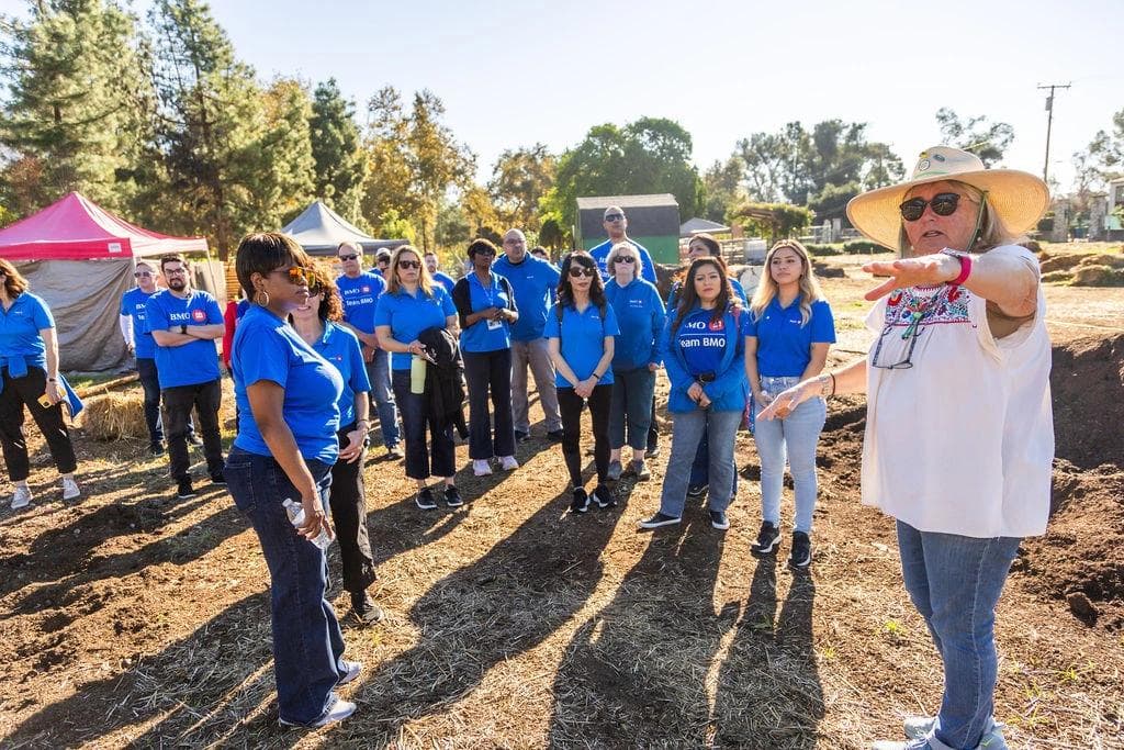 Mary McGilvray, Vice President, of the Altadena Community Garden provides guidance to BMO volunteers. 