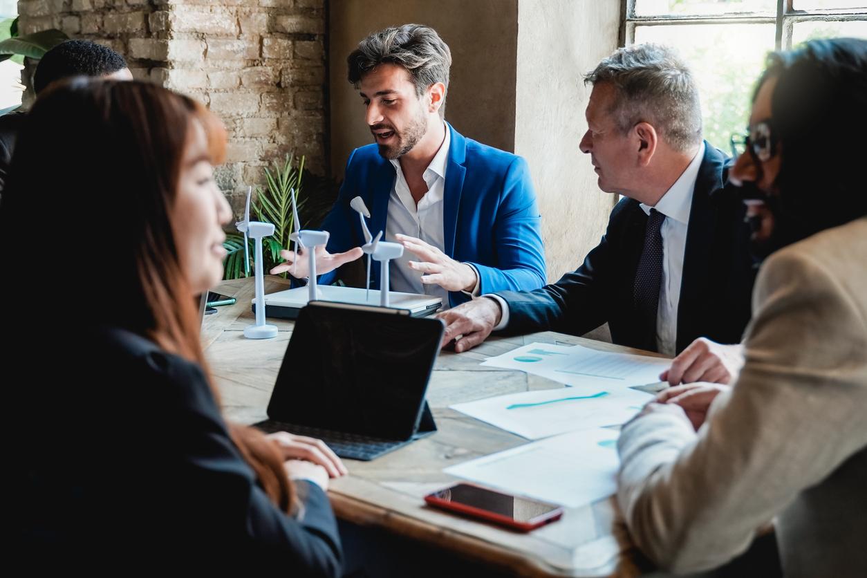 Business people working on sustainable renewable energy project