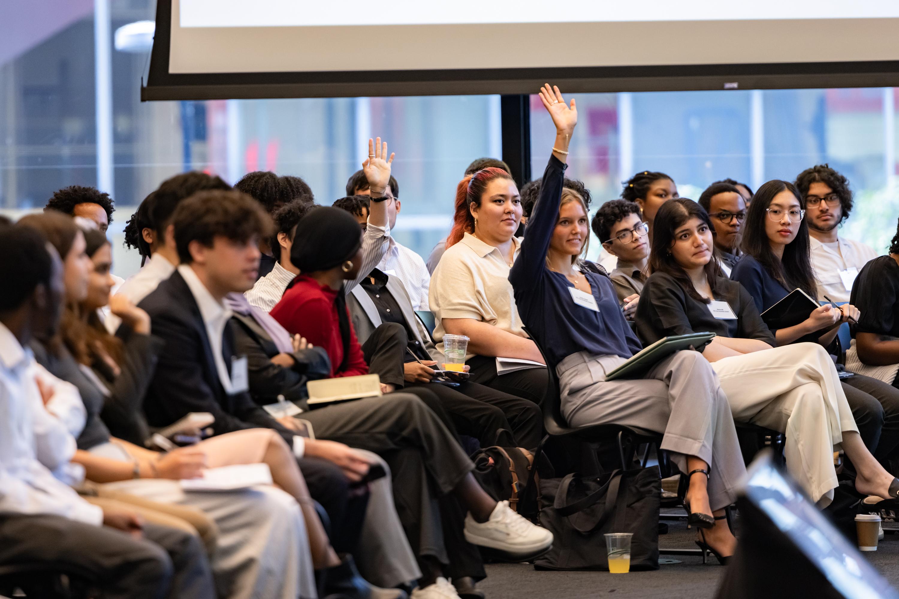 SEO Student raising hands