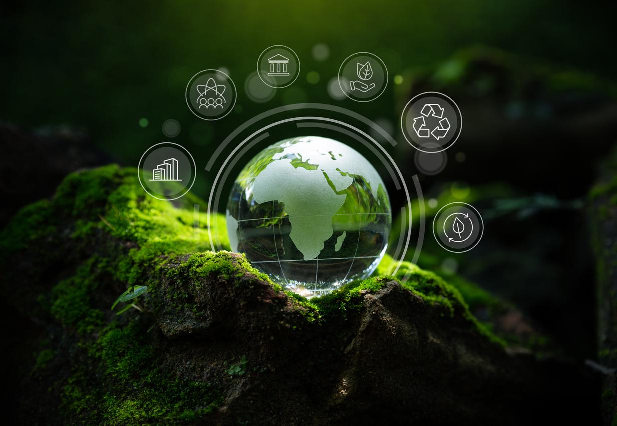 Crystal globe on moss, ESG icons