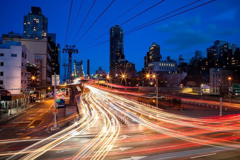 Car light trails from traffic in Midtown Manhattan, New York City.